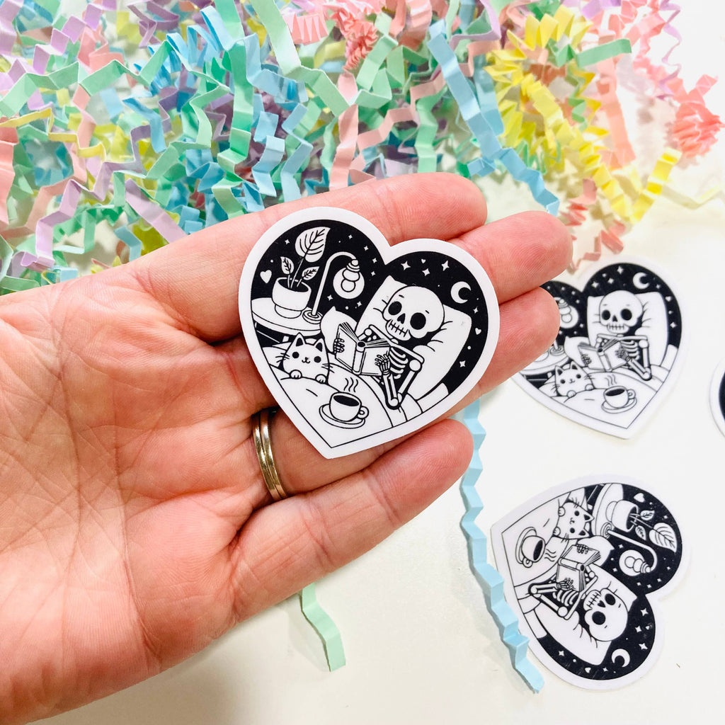 Cute Skeleton Reading a Book - Die Cut Sticker